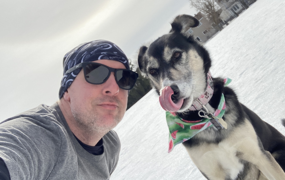 image of a runner and his dog